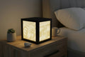 Lampe lithophanie 3D lumineuse personnalisée avec 4 photos souvenirs en relief blanc.